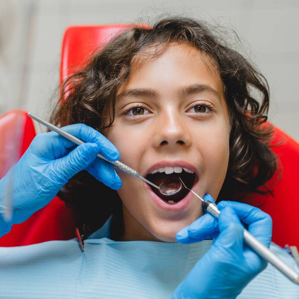 child patient during dental cleaning