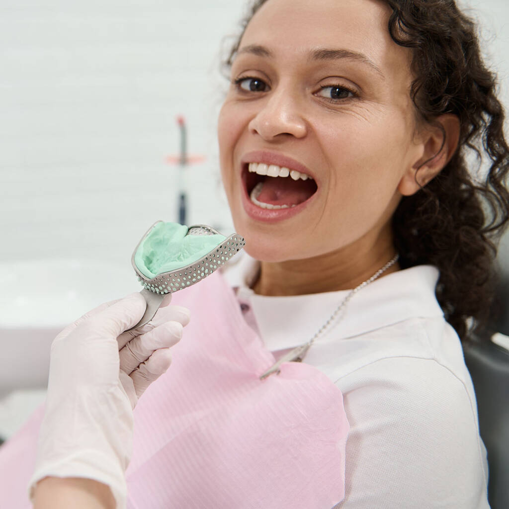 patient undergoing a tooth mold